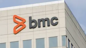 BMC Software logo with orange icon on a modern office building facade.