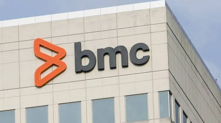 BMC Software logo with orange icon on a modern office building facade.