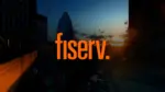 Fiserv logo over the London skyline at sunset featuring The Gherkin building.