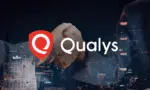 Qualys logo and text, with a handshake over a glowing night city, symbolizing partnership.